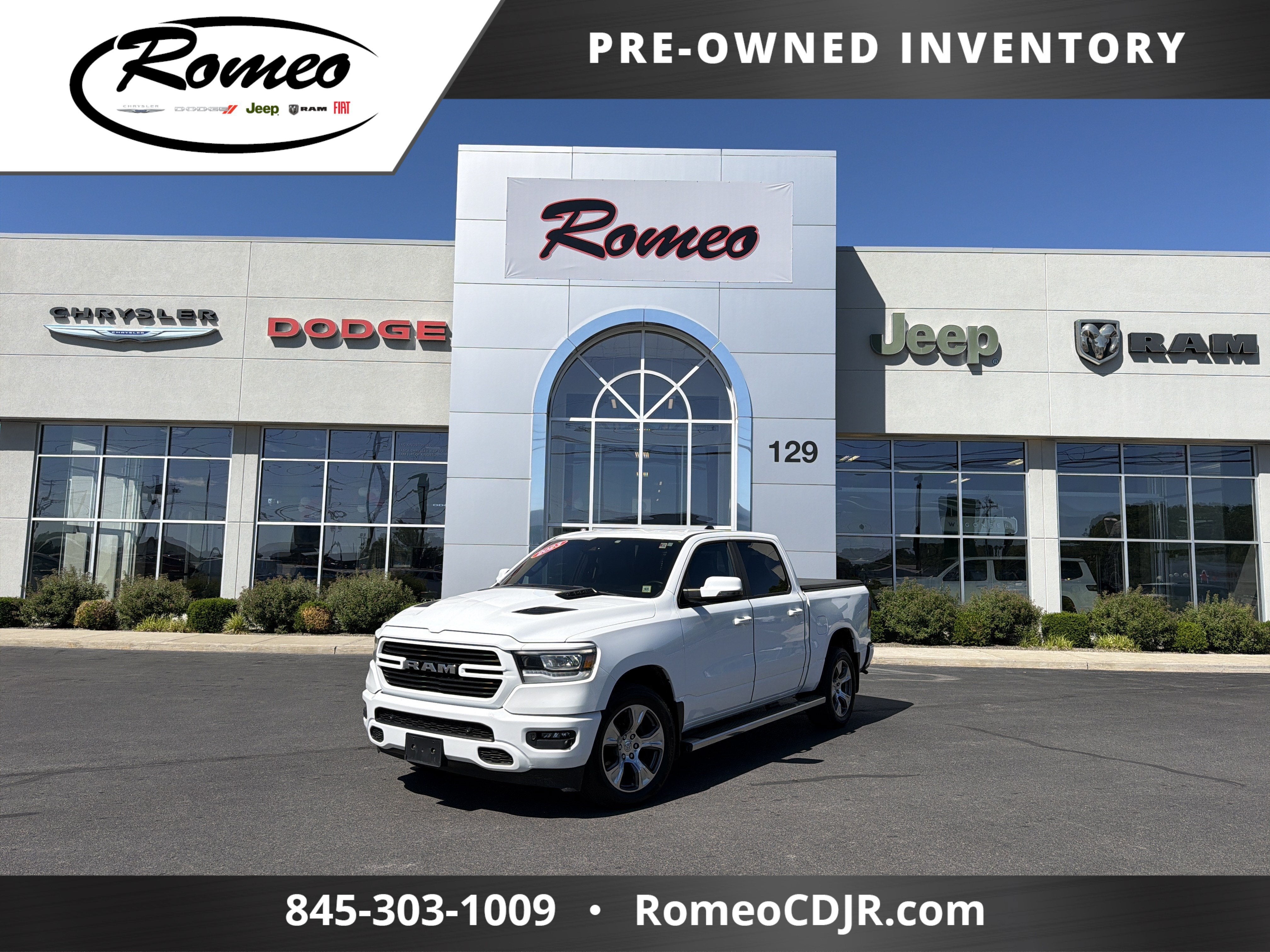 2023 RAM 1500 Laramie in Other — front three-quarter view