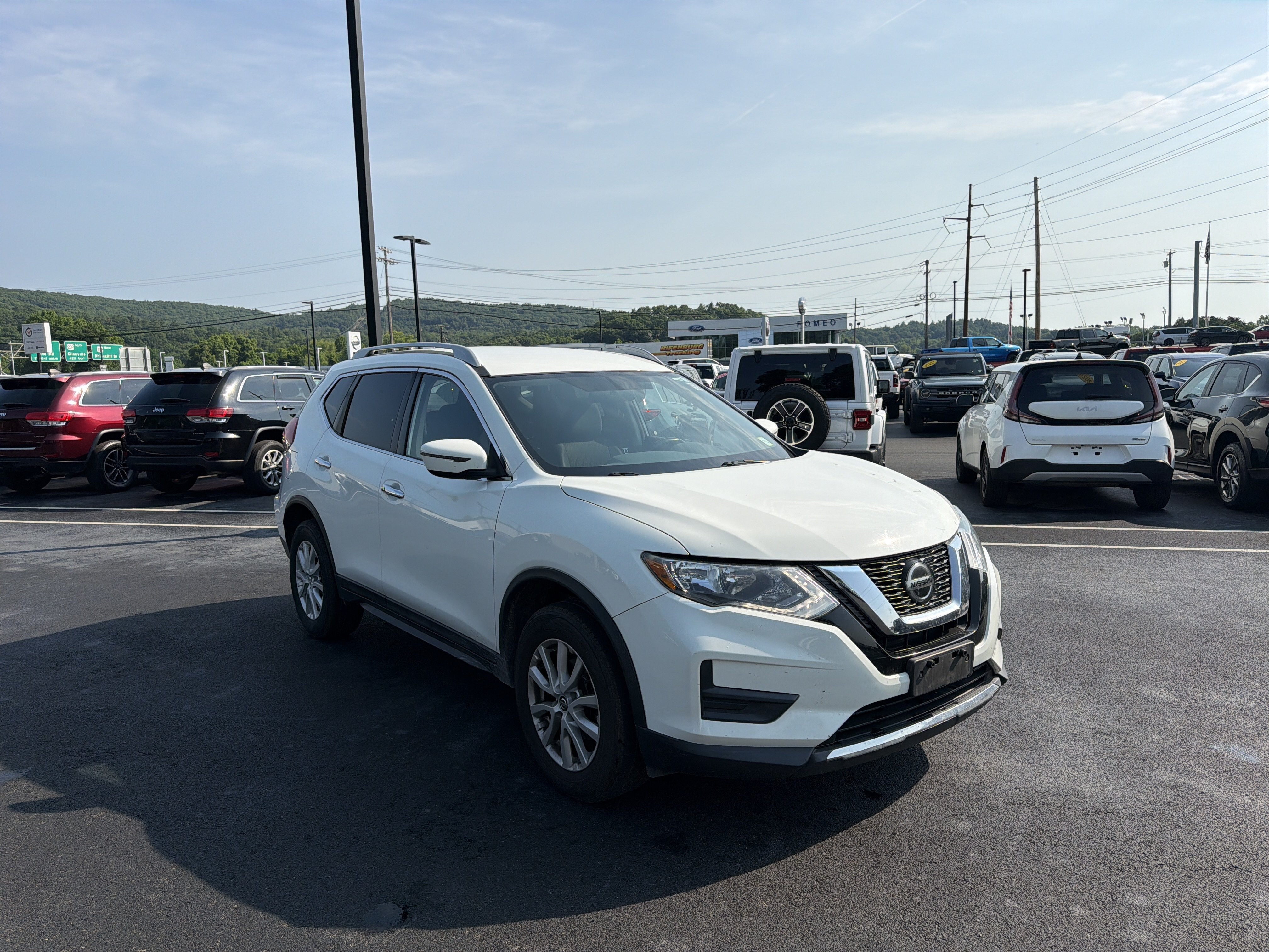 2018 Nissan Rogue — rear three-quarter view