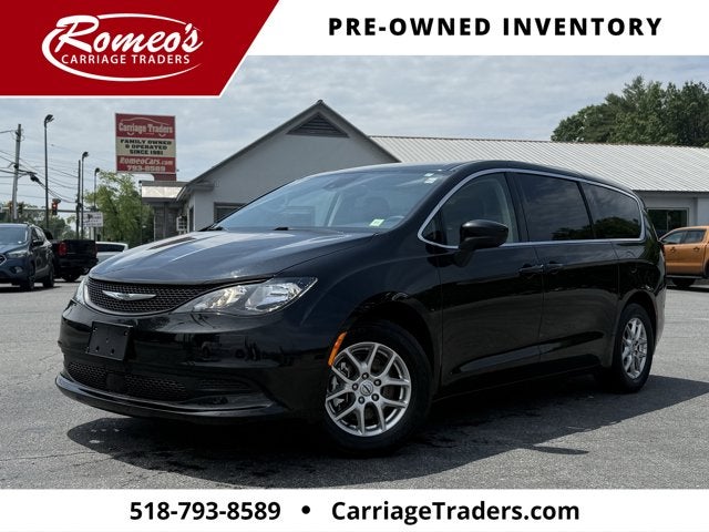 2023 Chrysler Voyager LX in Brilliant Black Crystal Pearlcoat — front three-quarter view