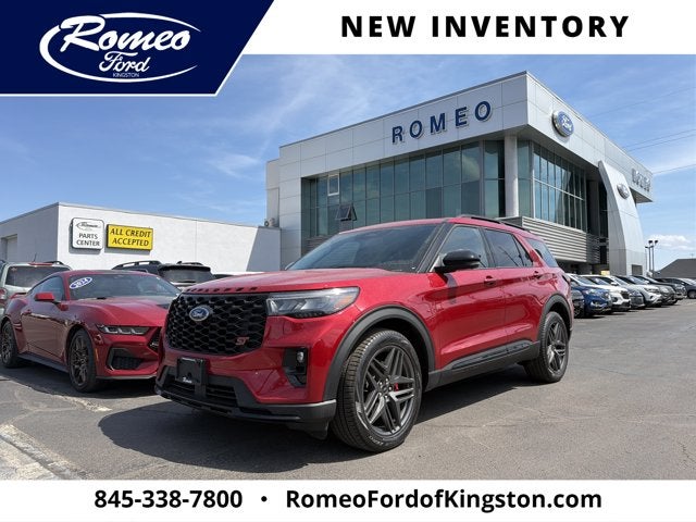 2026 Ford Explorer ST in Rapid Red Metallic Tinted Clearcoat — front three-quarter view