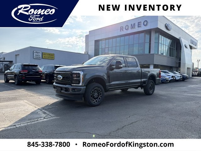2026 Ford Super Duty F-350 Platinum in Carbonized Gray Metallic — front three-quarter view