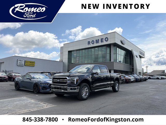 2026 Ford F-150 Lariat in Agate Black Metallic — front three-quarter view
