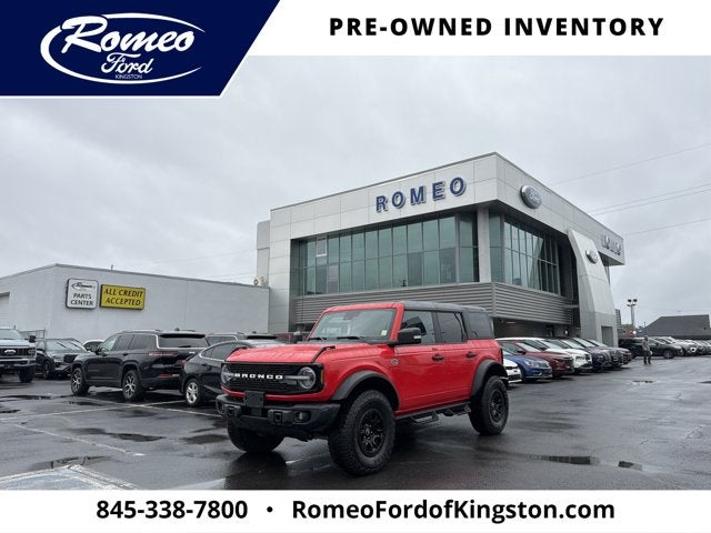 2023 Ford Bronco Wildtrak in Race Red — front three-quarter view