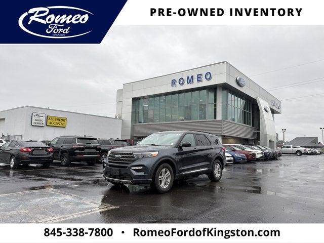 2022 Ford Explorer XLT in Blue Metallic — front three-quarter view