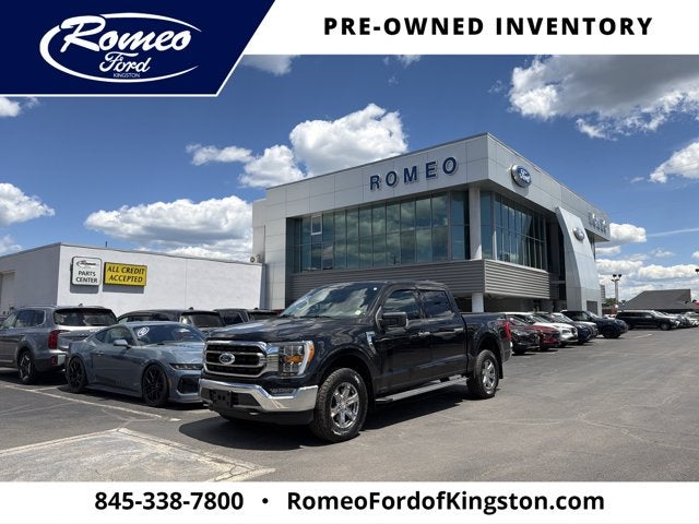 2021 Ford F-150 XLT in Black Metallic — front three-quarter view