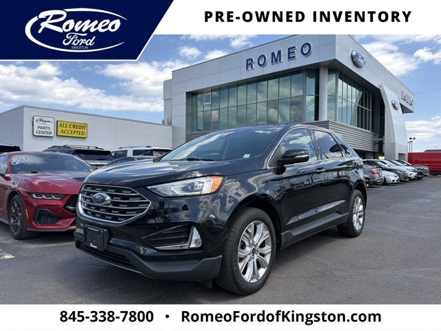 2021 Ford Edge Titanium in Black Metallic — front three-quarter view